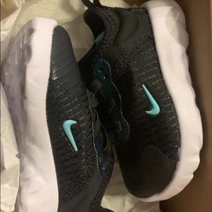 Black Nike runners size 2c